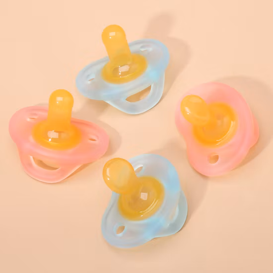 卸売ピンクの素敵な貝殻の形のニップラーベビー大人のおしゃぶり